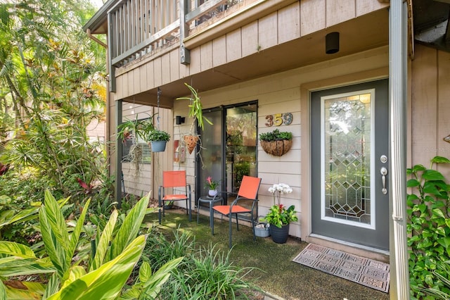 doorway to property featuring a balcony