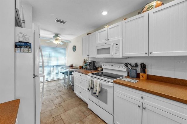 kitchen featuring ceiling fan, white cabinetry, backsplash, and white appliances