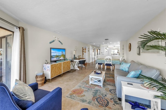 living room with light tile patterned flooring