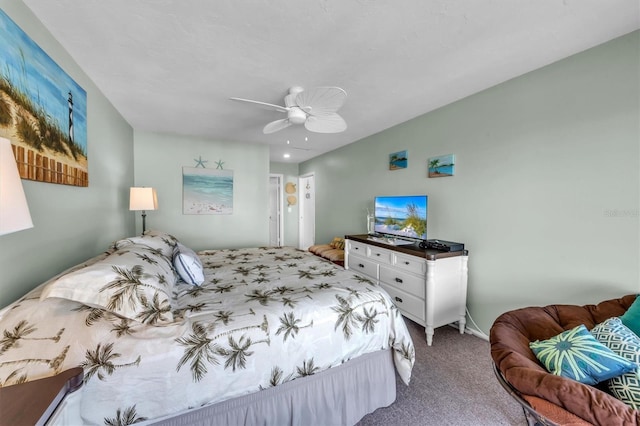 bedroom with ceiling fan and carpet flooring