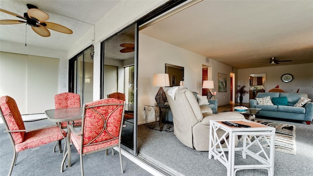 interior space featuring a baseboard heating unit and an outdoor living space