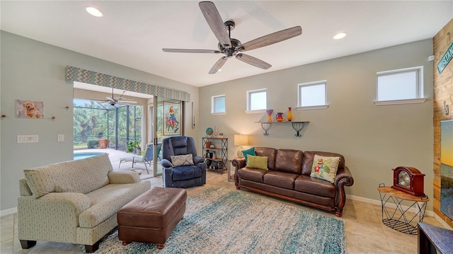 living room with light tile patterned flooring and ceiling fan