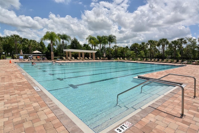 view of swimming pool featuring a patio