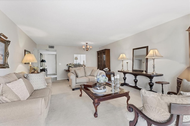 542 Lakeside Dr Unit 542, Bradenton, FL 34210 - living room with visible vents, light colored carpet, and a notable chandelier