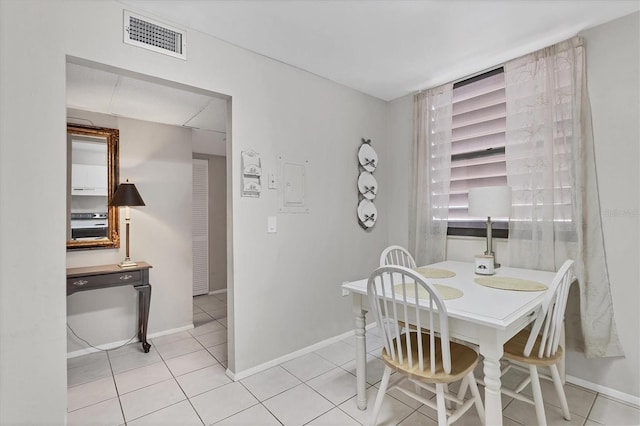 542 Lakeside Dr Unit 542, Bradenton, FL 34210 - dining room with baseboards, visible vents, and light tile patterned floors