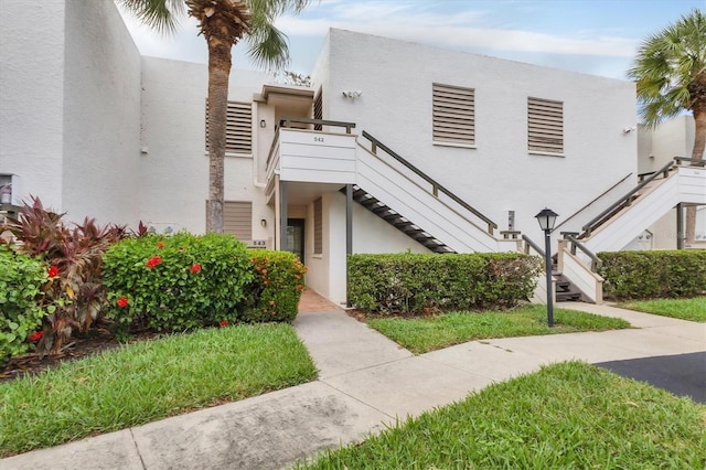 542 Lakeside Dr Unit 542, Bradenton, FL 34210 - view of property featuring stairs