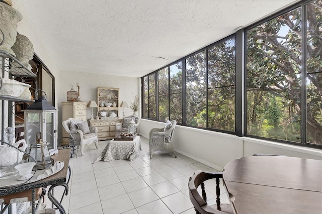 542 Lakeside Dr Unit 542, Bradenton, FL 34210 - sunroom / solarium featuring a textured ceiling and tile patterned floors