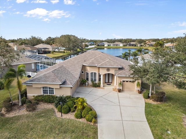 drone / aerial view featuring a water view