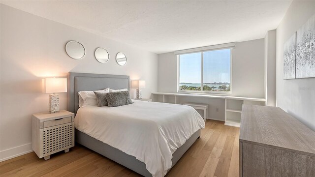 bedroom featuring light wood-type flooring