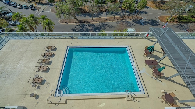 view of pool featuring a patio