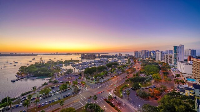 aerial view at dusk with a water view