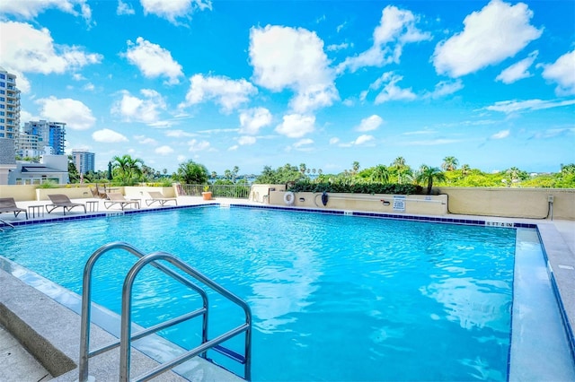 view of swimming pool with a patio