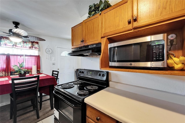 kitchen with ceiling fan and black range with electric cooktop