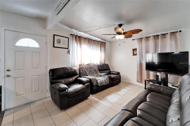 living room featuring ceiling fan, a healthy amount of sunlight, and light tile patterned floors