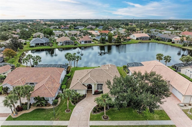 bird's eye view with a water view