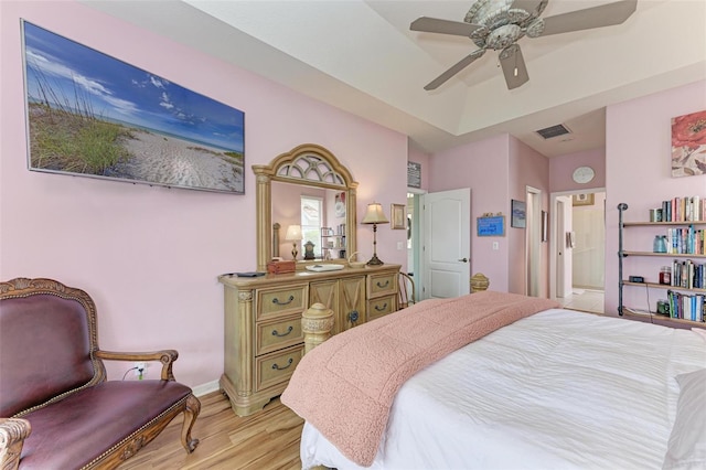 bedroom featuring ceiling fan and light hardwood / wood-style flooring