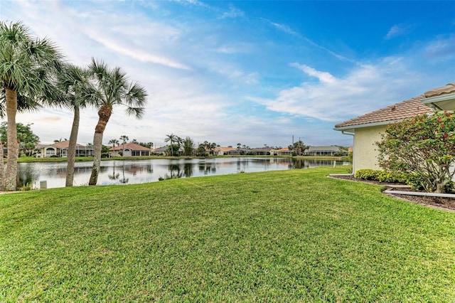 view of yard with a water view