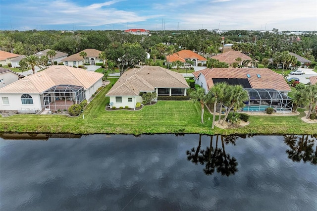 drone / aerial view featuring a water view