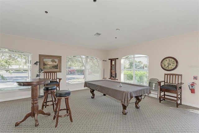 recreation room with billiards, light carpet, and plenty of natural light