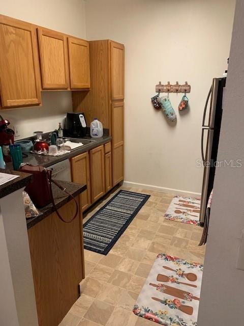 kitchen with stainless steel fridge