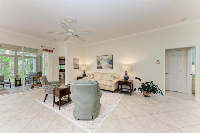 living room with ceiling fan, ornamental molding, and light tile patterned floors