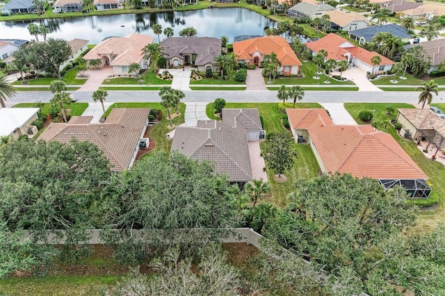 drone / aerial view with a water view