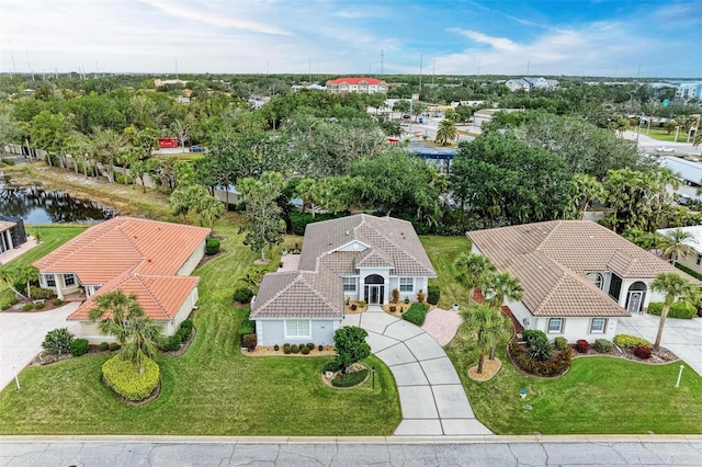 drone / aerial view featuring a water view