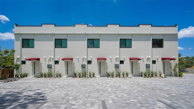 view of property with stucco siding