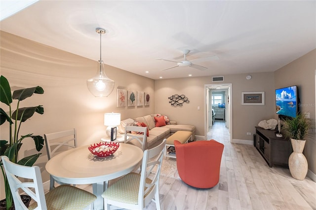 145 Avenida Messina Unit 3, Sarasota, FL 34242 - living room featuring ceiling fan and light wood-type flooring