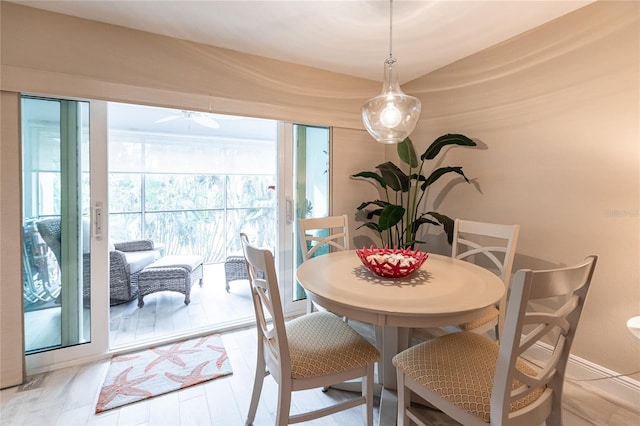 145 Avenida Messina Unit 3, Sarasota, FL 34242 - dining room with light wood-type flooring
