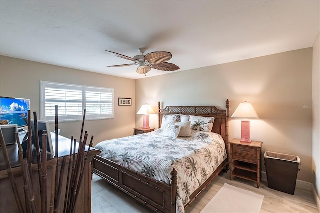 145 Avenida Messina Unit 3, Sarasota, FL 34242 - bedroom with ceiling fan and hardwood / wood-style flooring