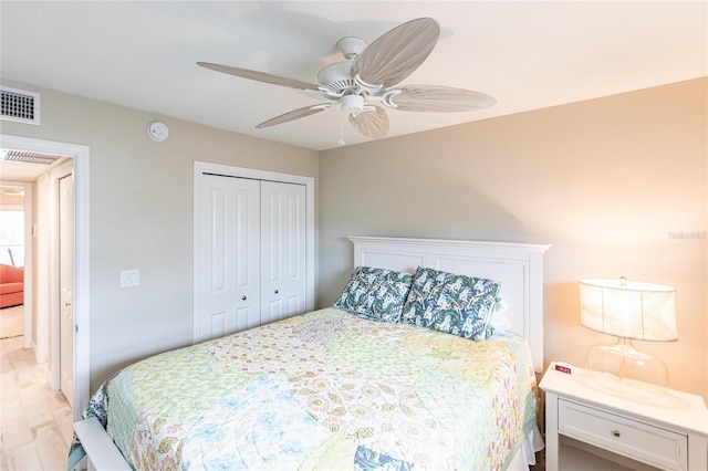 145 Avenida Messina Unit 3, Sarasota, FL 34242 - bedroom featuring ceiling fan and a closet