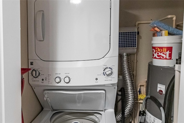145 Avenida Messina Unit 3, Sarasota, FL 34242 - clothes washing area featuring stacked washer and clothes dryer