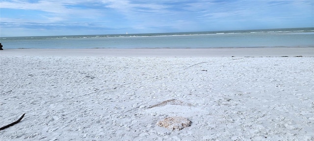 145 Avenida Messina Unit 3, Sarasota, FL 34242 - property view of water featuring a beach view