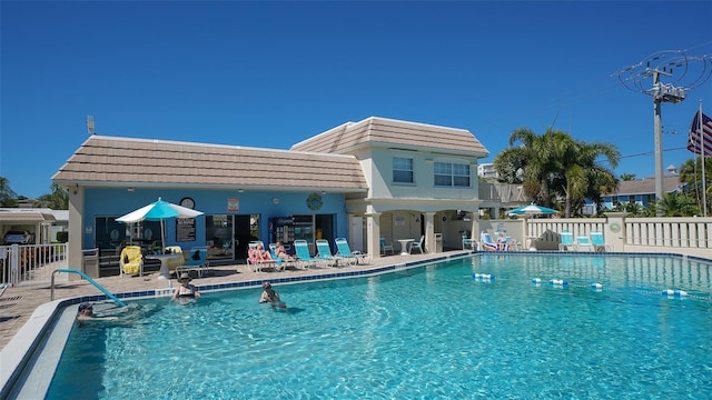 view of pool featuring a patio