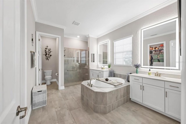 full bathroom featuring separate shower and tub, crown molding, and vanity