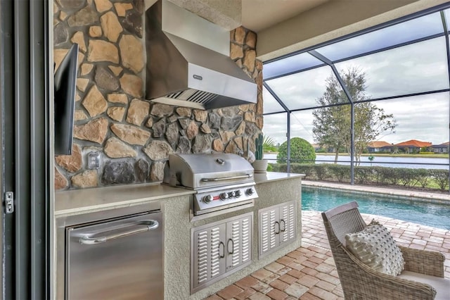 view of patio with area for grilling and glass enclosure