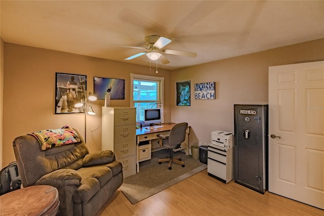 office space with ceiling fan and light wood-type flooring