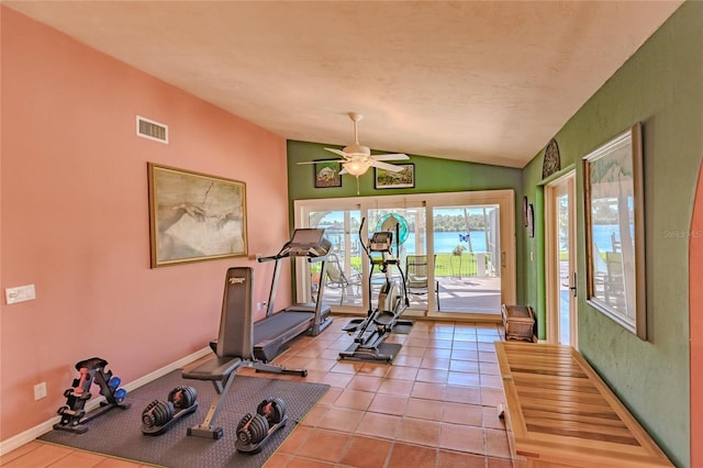 workout room featuring lofted ceiling and ceiling fan