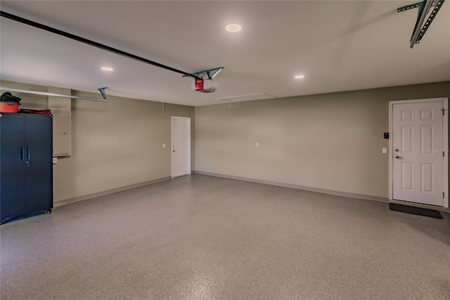 garage featuring a garage door opener