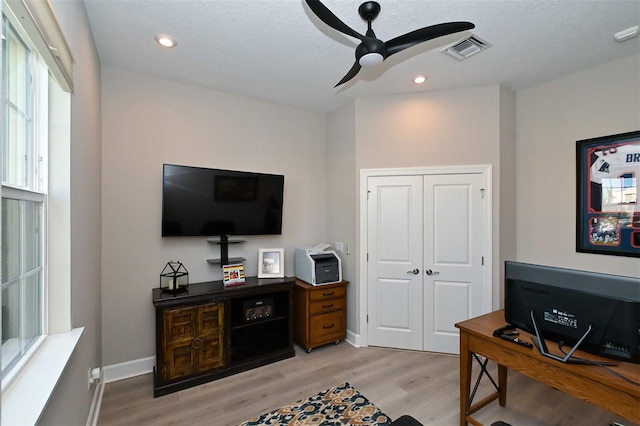 office area featuring ceiling fan and light hardwood / wood-style flooring