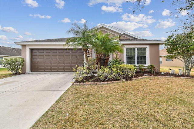 view of front of home with a front yard and a garage