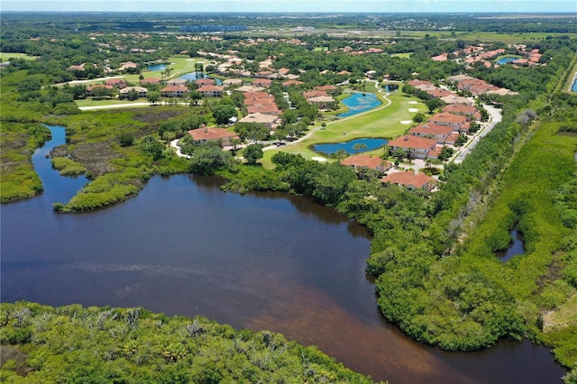 aerial view with a water view and view of golf course