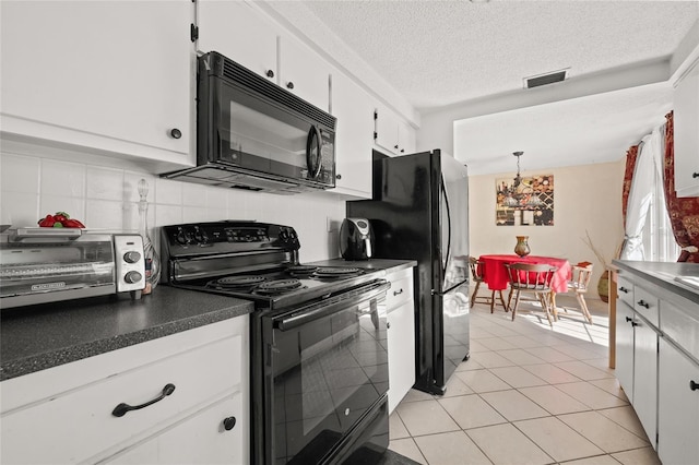 kitchen with decorative light fixtures, white cabinets, decorative backsplash, black appliances, and a textured ceiling