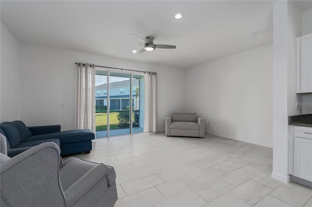 living room with ceiling fan