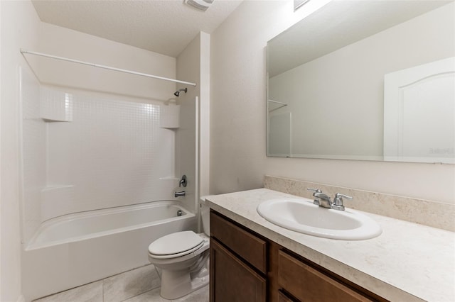 full bathroom with a textured ceiling, bathtub / shower combination, tile patterned flooring, toilet, and vanity