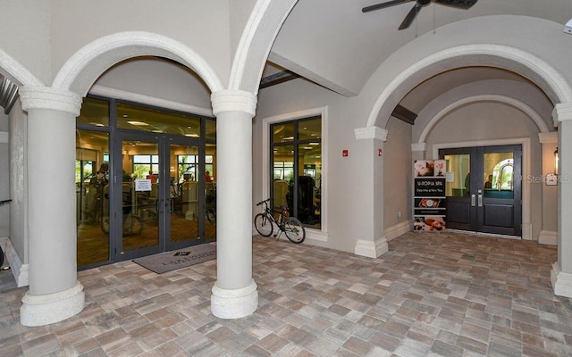 doorway to property featuring french doors and ceiling fan