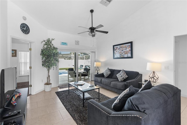 living room featuring ceiling fan and light tile patterned floors