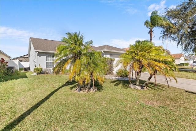 view of front of home with a front lawn