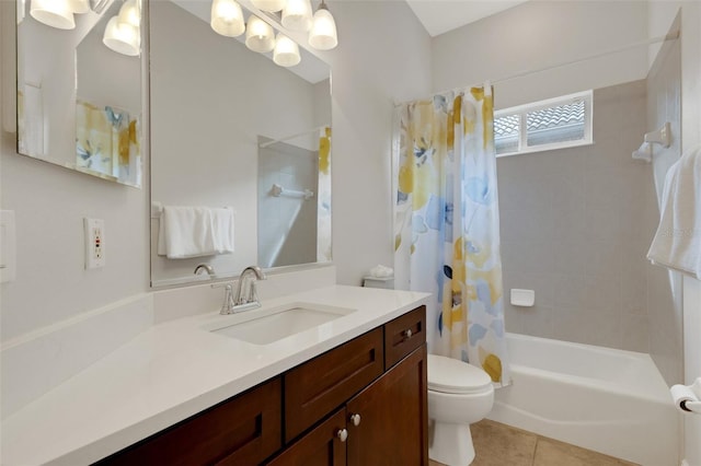 full bathroom with toilet, vanity, tile patterned flooring, and shower / bath combination with curtain